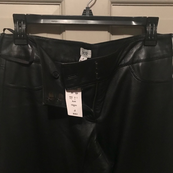 Black leather straight leg pants
